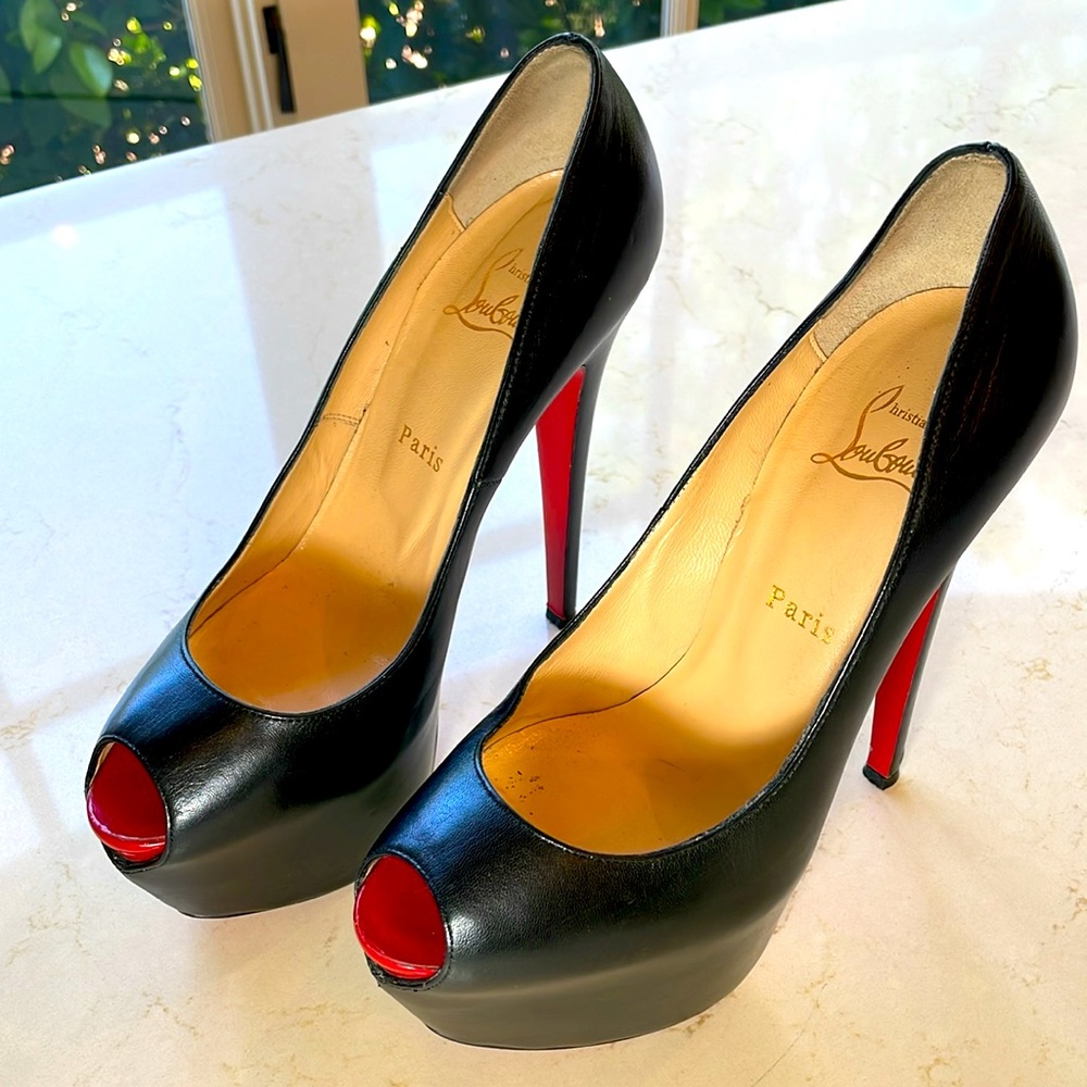 Christian Louboutin, black platform pumps.